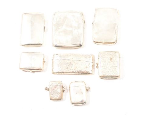 Small collection of silver cases, including; a vesta, William Hair Haseler, Birmingham 1921, three other vesta cases, a card 