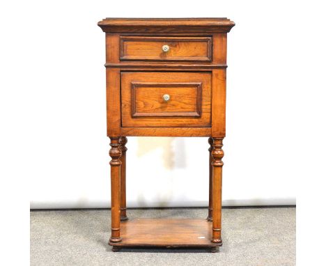 French oak side table, drawer over a cupboard, the turned legs joined by a shelf, 45x33cm, height 83cm.   Condition report:So