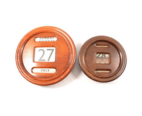 Walnut cased wall mounted perpetual calendar, circular, 31cm, working, and another small oak cased petpetual calendar, 23cm, 