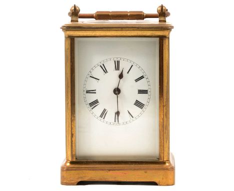 French brass carriage clock, enamelled dial, movement striking on a gong, 15cm.
