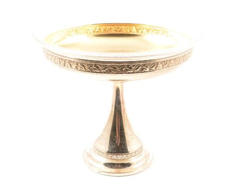 WMF circular covered bowl, enbossed lid and sides decorated with leaves, with glass liner, diameter 16cm, and a pedestal frui