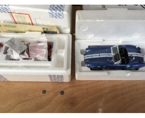 A Crestley collection boxed diecast Shelby Cobra and a Franklin Mint boxed 1948 MGTC 1:24 scale