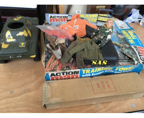 Action man vintage Palitoy Training tower , Armoured tank, a kayak, clothes , a SAS dingy and a figure has hand missing