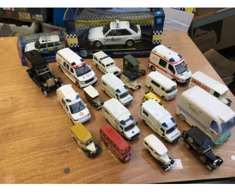 A collection of loose diecast vehicles also including a boxed Scalextric police Range Rover and 1:18 scale Ford Escort 1.1L E