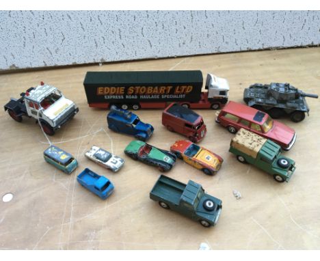 A collection of playworn diecast vehicles including Dinky, Matchbox etc