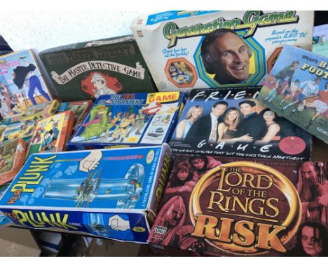 A collection of boxed board games and jigsaw including Ghostbusters, Rupert, Lord of the rings etc