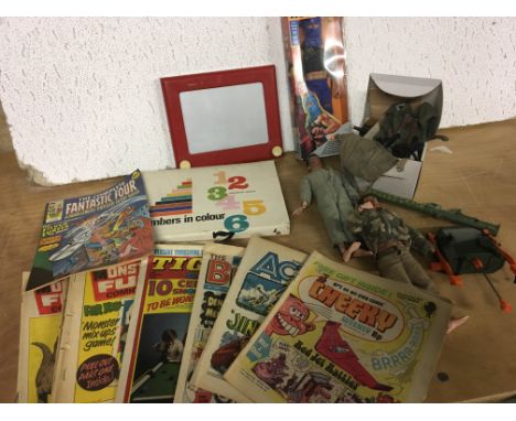 Action man figures including weapons and accessories, also including an Etch a sketch and comics including Monster fun, Tiger
