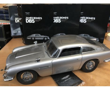 James Bond Aston Martin DB5 , 1:8 scale , diecast, along with a set of bound instructions to build the car