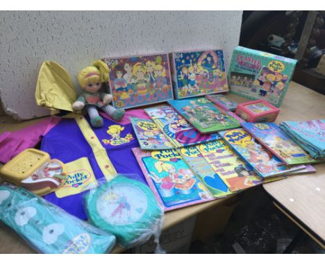 Vintage Polly pocket including a wall clock, doll, jigsaws, books and annuals, plastic Mac (age 3-4),Duvet cover and pillow c