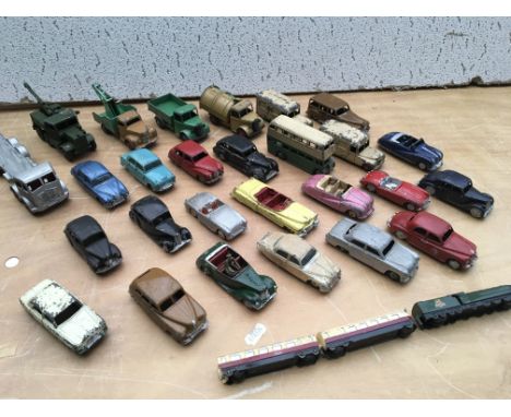 A collection of playworn vintage diecast vehicles including corgi and Dinky