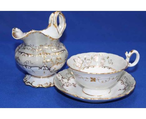 LATE 19TH CENTURY GREY AND GILT TEA SET
decorated with gilt scrolling foliate pattern, comprising, cream, sugar bowl, slops b