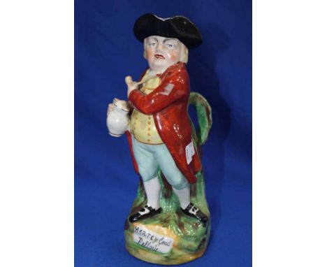 19TH CENTURY STAFFORDSHIRE TOBY JUG
of 'Hearty Good Fellow', a figure of a man on a knoll with a tankard of beer and pipe, 27