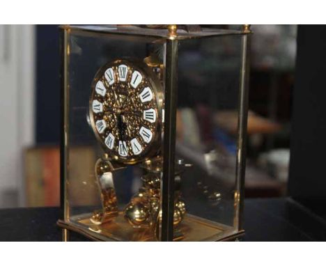 KUNDO CLOCK AND A WALL BAROMETER 