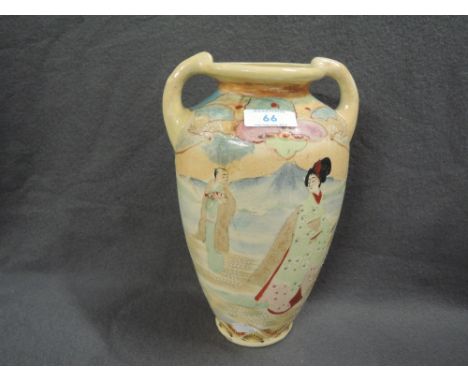 A vintage ceramic vase in a Satsuma style with hand painted decoration
