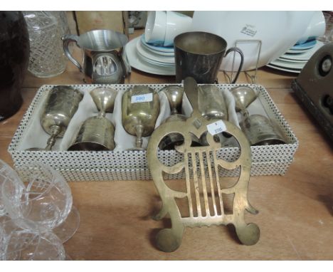 A set of plated goblets and similar tankards also Lute shaped kettle stand