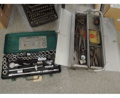 A selection of mechanics and garage tools including socket set 
