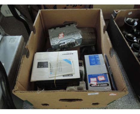 A selection of vintage car radios and a glass and metal bulk head style outside lamp