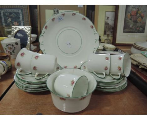 A part tea service un marked and un named with floral transfer print 19 pieces