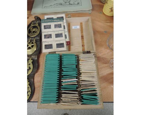 A selection of vintage photographic film projector slides various subject matter