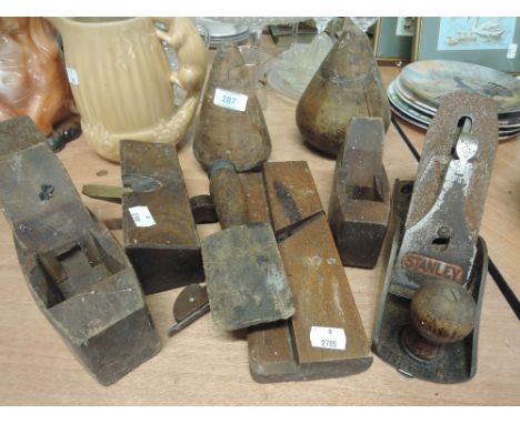 A selection of vintage treen woodworkers tools including block plane moulding and rebate