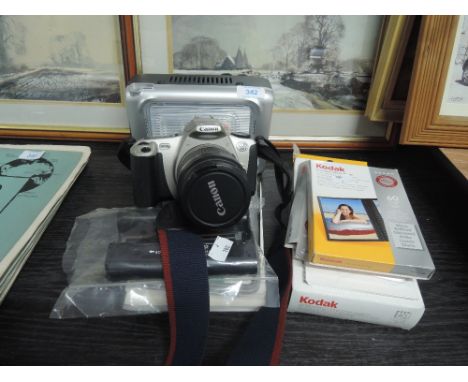 A Canon Digital camera model Eos 300 with extras
