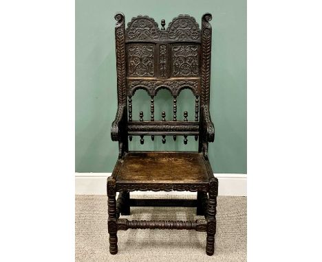 ANTIQUE GOTHIC CARVED OAK ARMCHAIR, shaped crest-rail with floral carving, the Roman numerals XIII initialled I R and DG, ove