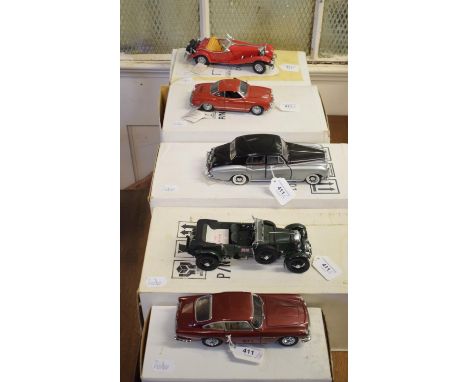 A Franklin Mint precision Models 1:24 scale 1967 Volkswagen Karmann Ghia, and four others, all boxed (5) 