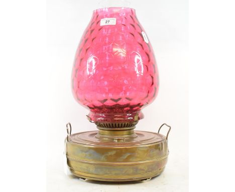 A large conservatory lamp, with cranberry glass shade, 43.5 cm high, and eleven other oil lamps (12) 