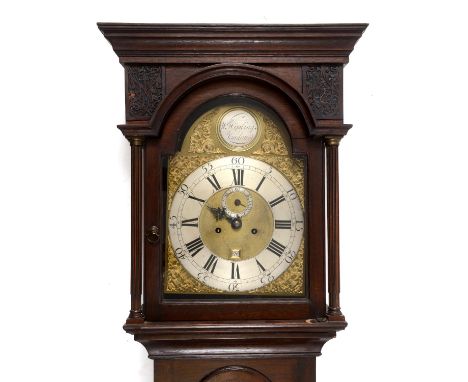 A longcase clock, the 30.5 cm arched square brass dial signed Wm Kipling, London, the silvered chapter ring with Roman numera