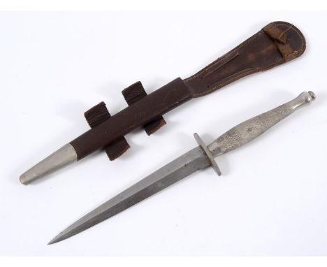 A Fairbairn & Sykes style fighting knife, the guard stamped 56, with a leather scabbard See illustrationReportNo, the scabbar