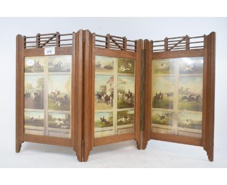 A Victorian oak three fold table top screen, with gate/fence decoration, each inset panels of horse racing and hunting, 38 cm