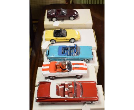 A Danbury Mint 1:24 scale 1959 Cadillac series 62, and four others, boxed (5)Report by GHAll with paperwork.Only one of the c