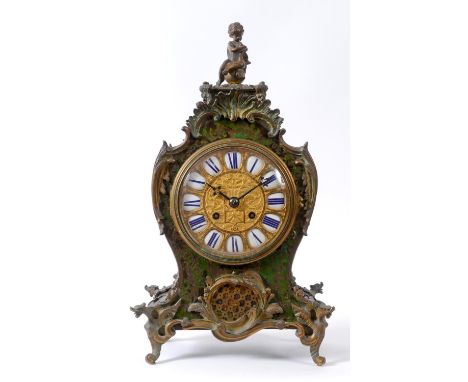 A Louis XVI style mantel clock, the 13.5 cm diameter gilt metal dial with Roman enamel numerals, fitted an eight day Japy Fre