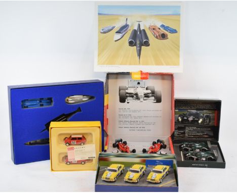 An Onyx Mansell World Champion 1992 commemorative limited edition set of four of his cars, signed by Nigel Mansell, a Lledo L