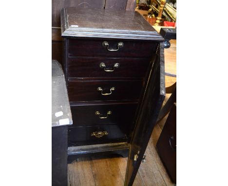 A pair of mahogany pedestal chests, each having a panel door enclosing five graduated long drawers, on bracket feet, 63 cm wi