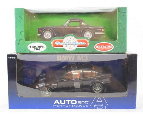 An Auto Art 1:18 scale BMW M3, and a Britains 1:18 scale Triumph TR6, both boxed (2)Report by GHBoth boxes a little knocked a