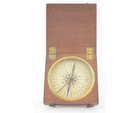 A 19th century pocket compass, in a mahogany case, 9 cm wide 