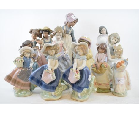 A Lladro group, of a boy and a girl, matt, 24.5 cm high, three similar figures, a similar Nao figure and seven Lladro gloss f