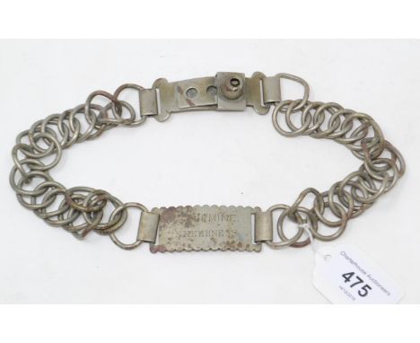 A 19th century chain link steel dog collar, H T Urmine, Sheerness, 2.5 cm deep 