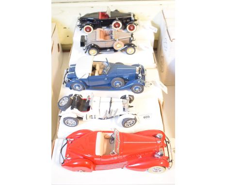 A Danbury Mint 1:18 scale 1934 Packard V-12 Le Baron Speedster, and four others, all boxed (5) 