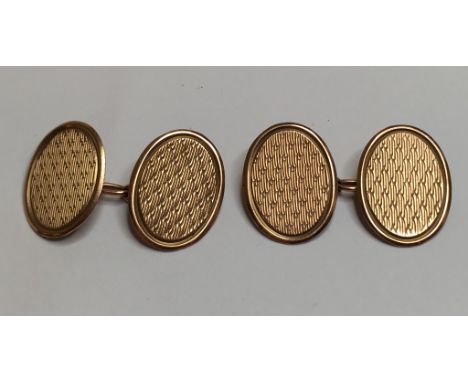EXTRA LOT:  A pair of 9ct gold cufflinks, with engine turned decoration, approx. 3.8g 