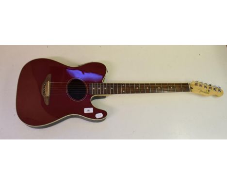 A Fender Telecoustic guitar, with built in pickup and gig bagReport by GHCosmetically appears to be in good condition with no