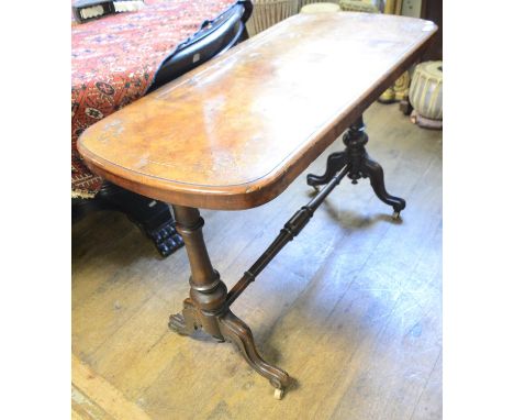 A Victorian walnut sofa table, the top with inlaid decoration, on turned legs and stretcher with downswept feet, 112 cm wide 