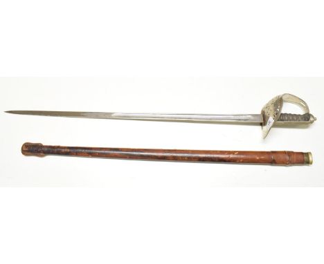 A George V sword, the guard stamped JEMADAR SAHIB BALY AMIN, with a leather scabbard 