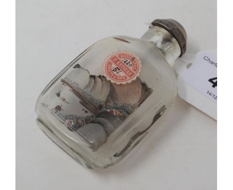A Chinese glass snuff bottle, with painted decoration, P. KYTICAS dealers label, 7.5 cm highReport by NGSome nibbles around n