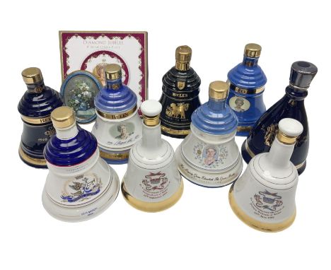 Bells, Scotch whisky, in seven Wade ceramic decanters, to include 50 year reign HM Queen Elizabeth II, Ninetieth Birthday of 