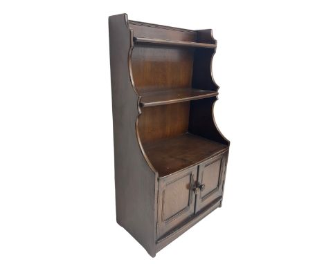 Ercol - open bookcase with two cupboardsDimensions: Height:&nbsp;111cm&nbsp; Length/Width:&nbsp;61cm&nbsp; Depth/Diameter:&nb