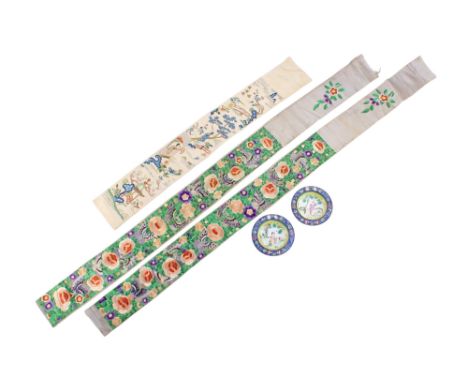 A pair of late 19th/early 20th century Chinese enamel pin dishes and three embroidered garment borders. The dishes painted wi