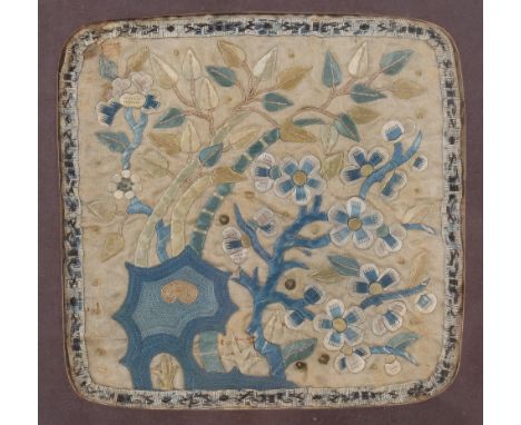 An 18th/19th century Chinese embroidery. In various stitches, depicting bamboo and plum blossom over a taihu rock in shades o