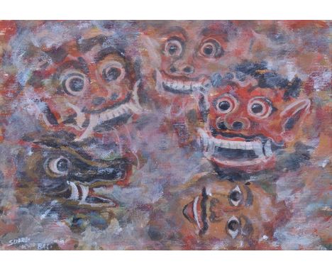 A 20th century Balinese painting of masks. Signed Suardi, Ubud Bali. 14cm x 20cm, glazed and in a green painted carved wood f